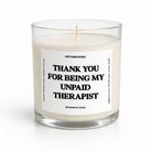 Candle in a glass jar with a label on a white background