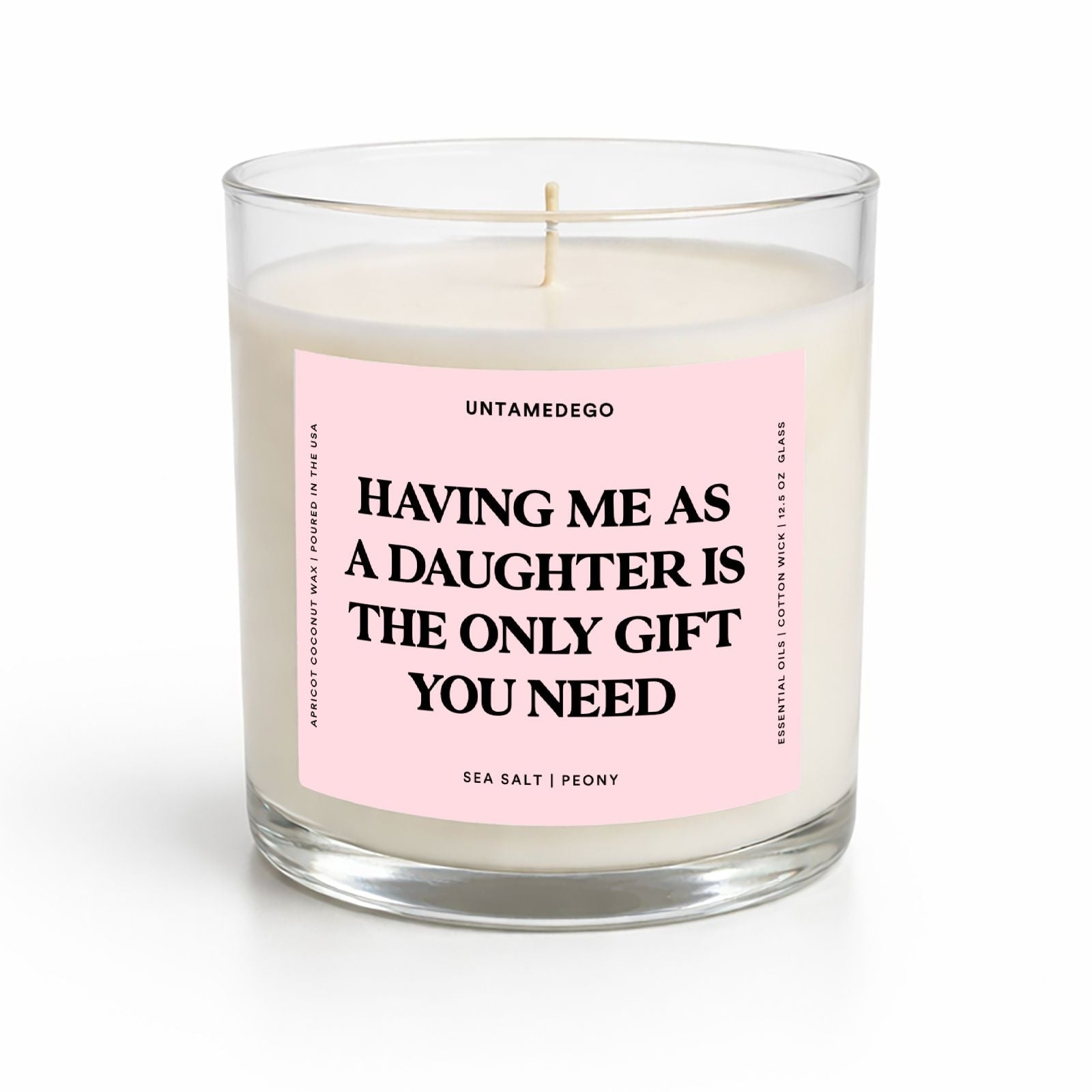 Candle with a pink label on a white background