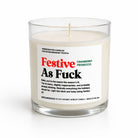 A handcrafted soy candle in a clear glass jar with a white label that reads 'Festive As Fuck' in red and black text, with 'Cranberry Prosecco' in green. The candle is photographed on a clean white background.