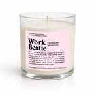 A handcrafted soy candle in a clear glass jar with a white wick and a light pink label reading 'Work Bestie' and 'Cranberry Prosecco' by Unlandego, shown on a white background.