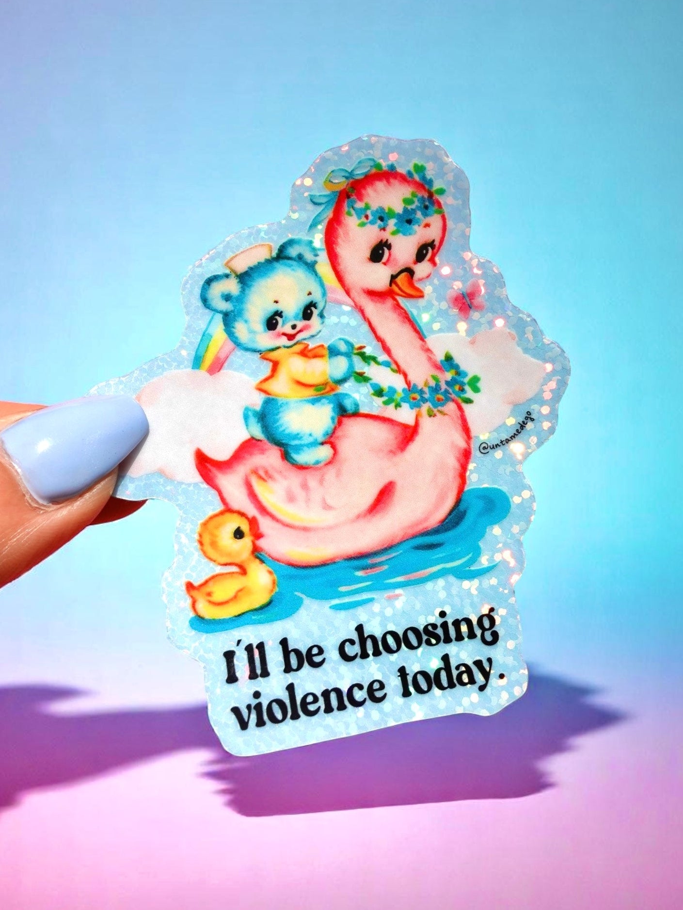 Sticker with cartoon characters and text 'I'll be choosing violence today' held by a hand.