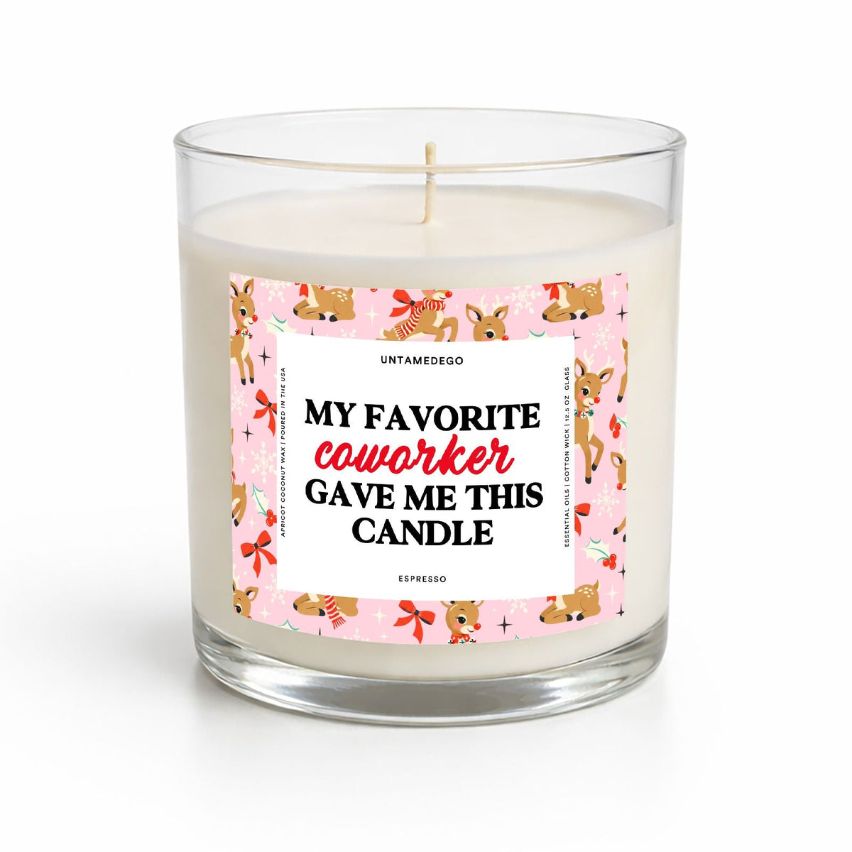 A clear glass jar candle with white wax and a single wick, featuring a pink label with cartoon characters and the text 'MY FAVORITE coworker GAVE ME THIS CANDLE' on a white background.