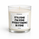A clear glass jar candle with cream-colored wax and a white label featuring bold black text that reads 'IT'S FINE I'M FINE EVERYTHING IS FINE'. The brand name 'UNTAMEDEGO' is visible at the top of the label, with 'ESPRESSO' at the bottom.