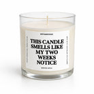 A glass jar candle with white wax and a single wick, featuring a white label with bold black text that reads 'THIS CANDLE SMELLS LIKE MY TWO WEEKS NOTICE' by Untamedgo, on a clean white background.