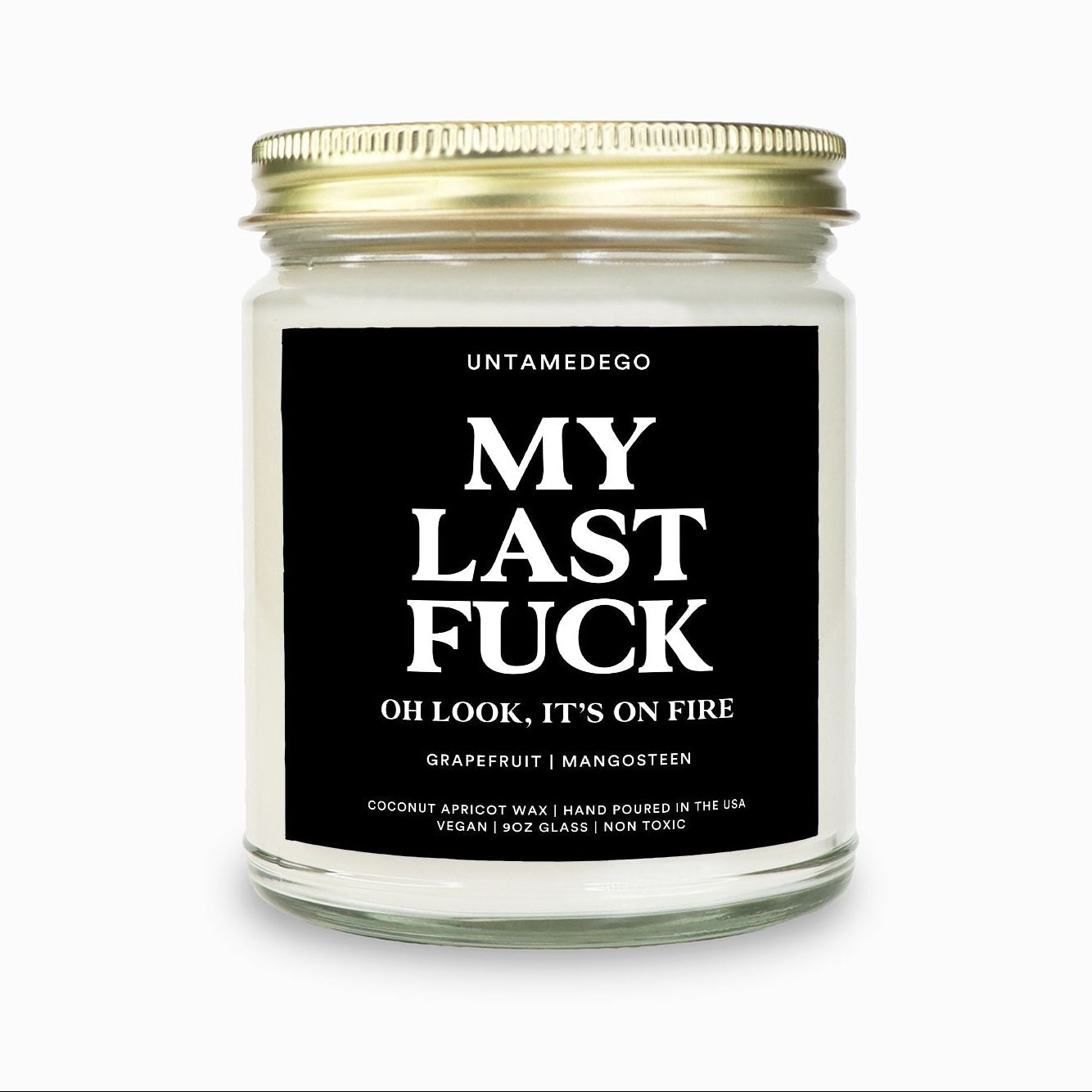 Candle with a black label on a white background