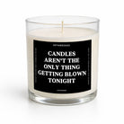 A clear glass jar candle with off-white wax and a black square label featuring white text that reads, 'CANDLES AREN'T THE ONLY THING GETTING BLOWN TONIGHT' with 'UNTAMEDOO' at the top and 'LAVENDER' at the bottom.