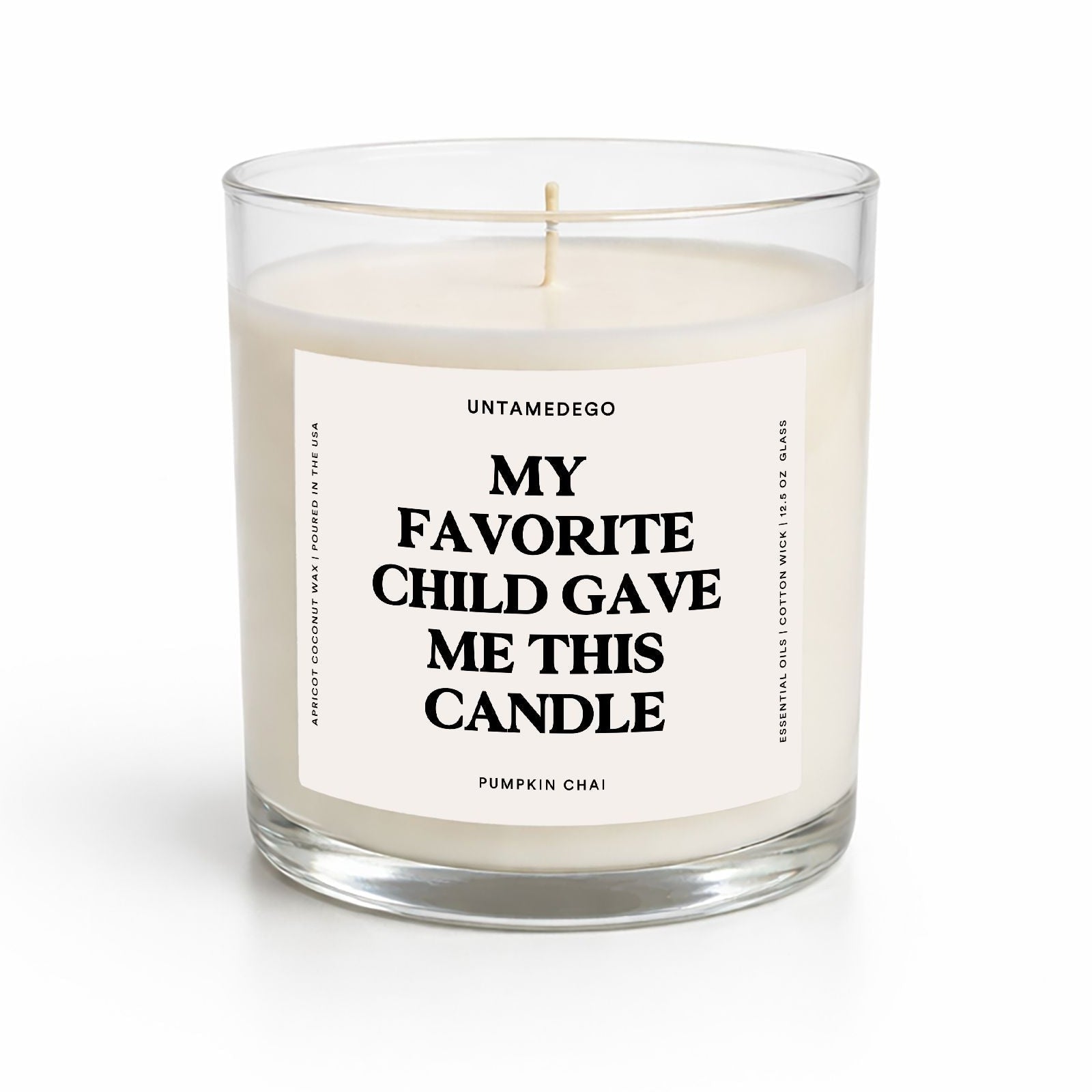 Candle in a glass jar with a label on a white background