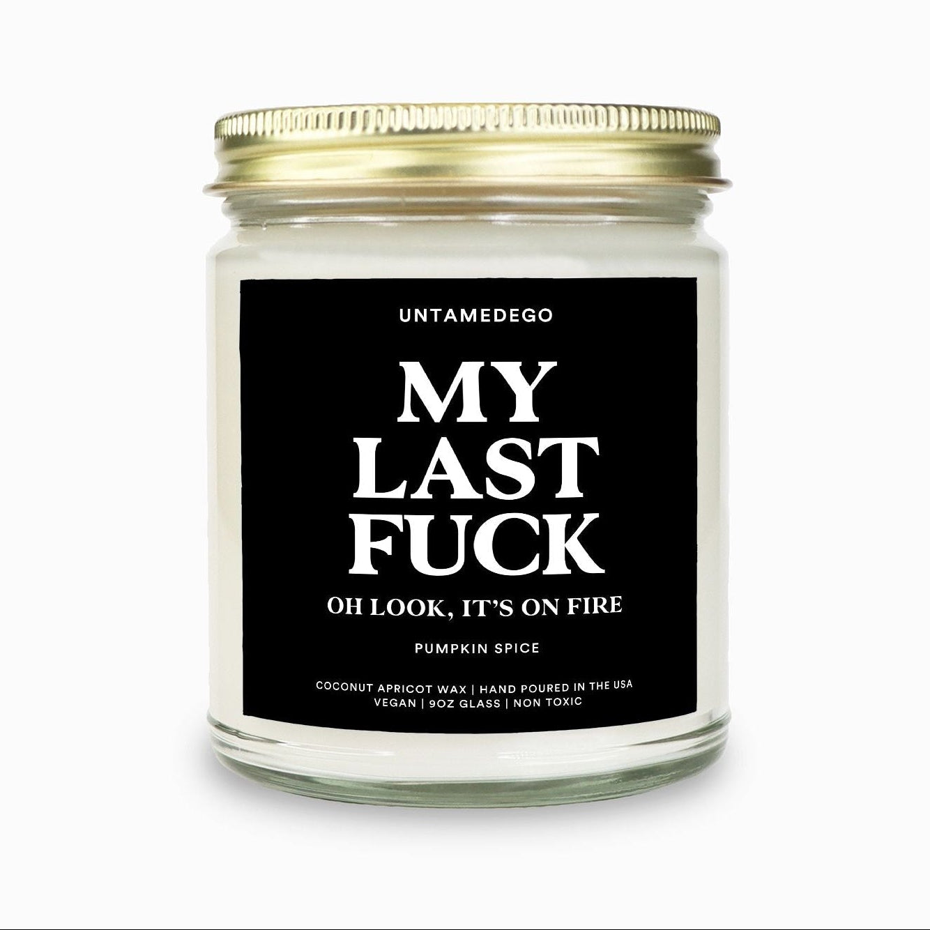 Candle with a black label on a white background