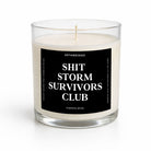 A clear glass jar candle with white wax and a black label reading 'SHIT STORM SURVIVORS CLUB' and 'PUMPKIN SPICE' by UNTAMEDEGO, shown on a clean white background.