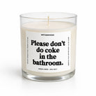 A clear glass jar candle with creamy off-white wax and a white label featuring bold black text that reads, 'Please don't do coke in the bathroom.' The brand name 'UNTAMEDEGO' is visible at the top of the label.