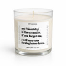 A clear glass jar candle with white wax and a white label featuring black text. The label reads 'UNTAMEDEGO' and includes the scent name 'FRESH LINEN | SEA SALT' and a humorous quote.