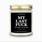 Candle with a black label on a white background