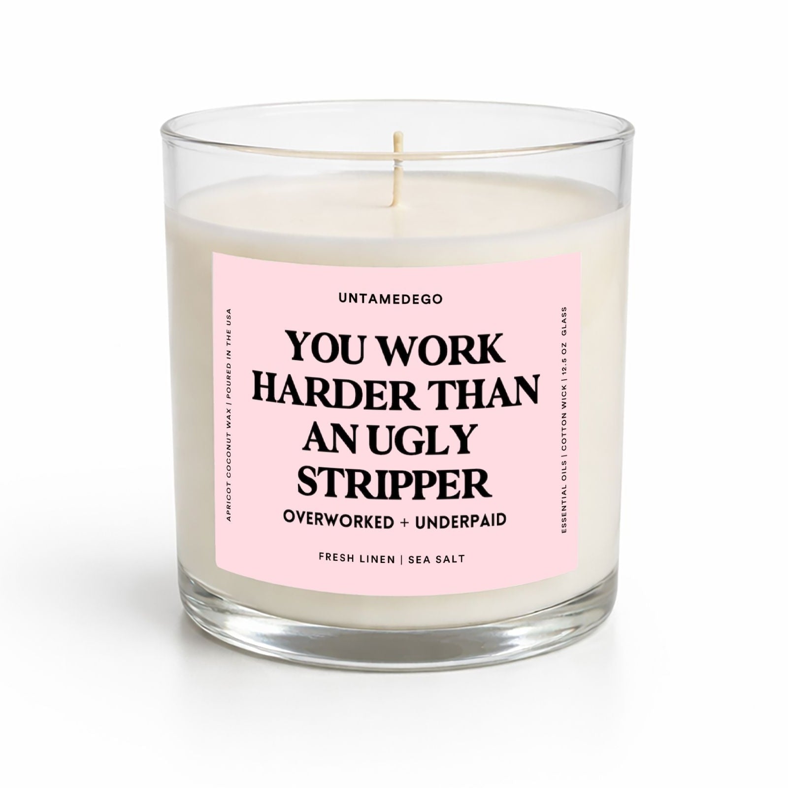 Candle with a pink label on a white background