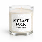 Candle in a glass jar with a label on a white background
