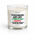 A single-wick candle in a clear glass jar with cream-colored wax and a white label featuring the text 'COWORKERS ARE LIKE CHRISTMAS LIGHTS' in black, green, and red. The brand name 'UNTAMEDGOGO' is visible at the top of the label.