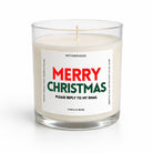 A personalized holiday candle in a clear glass jar with white wax and a single wick. The front features a white label with the text 'MERRY CHRISTMAS' in red and green, and 'VANILLA BEAN' at the bottom.