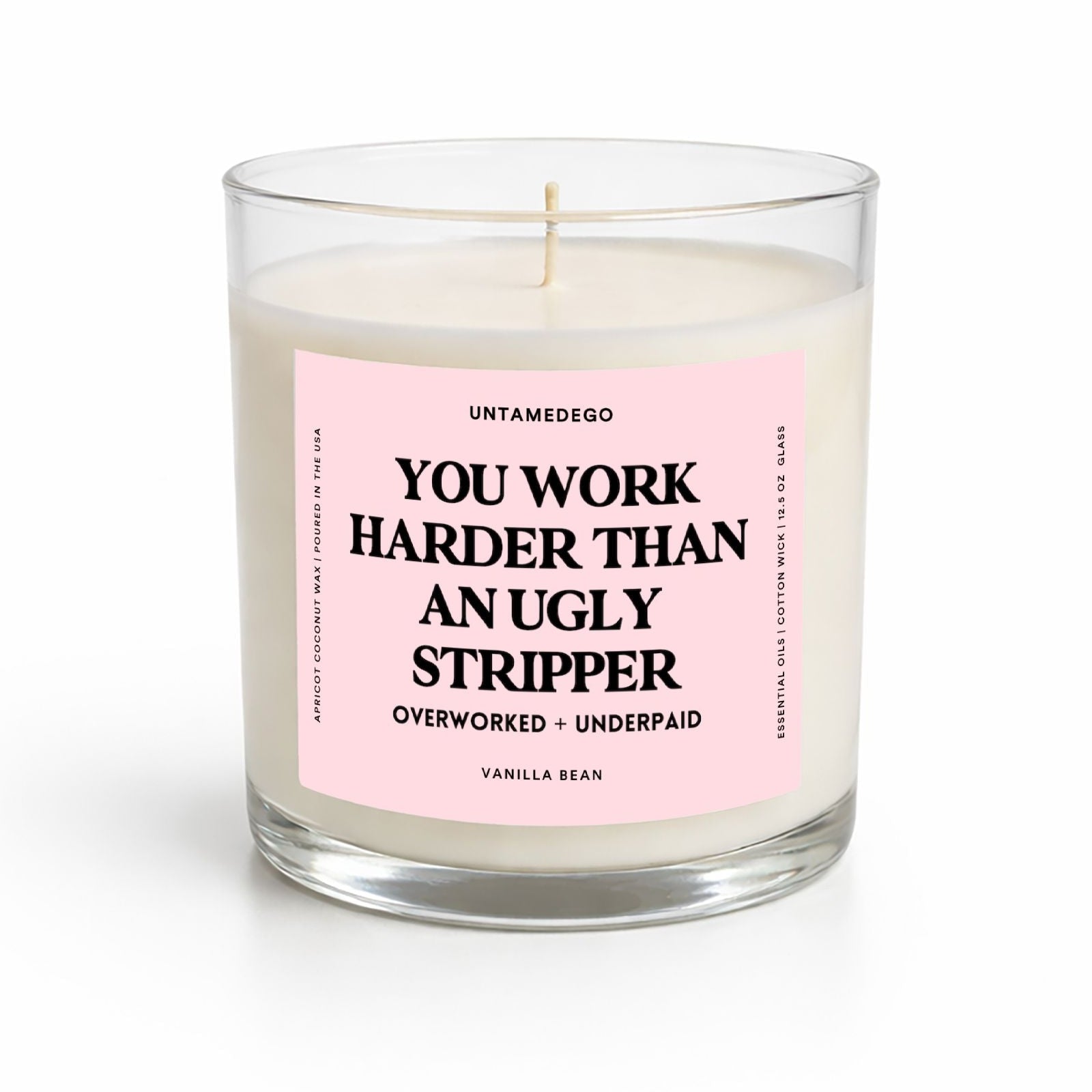Candle with a pink label on a white background