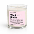 A handcrafted soy candle in a clear glass jar with a pink label reading 'Work Bestie' and 'Vanilla Bean,' photographed on a clean white background.