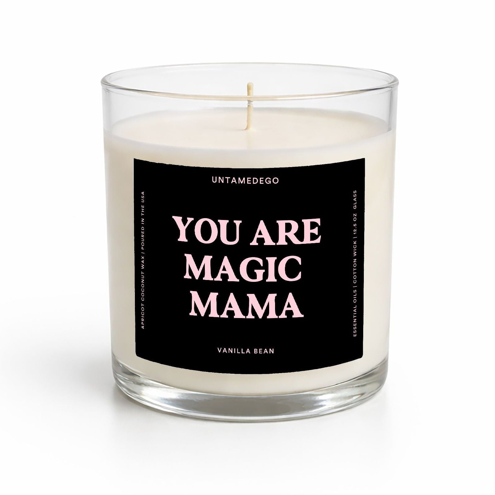 Candle in a glass jar with a black label on a white background