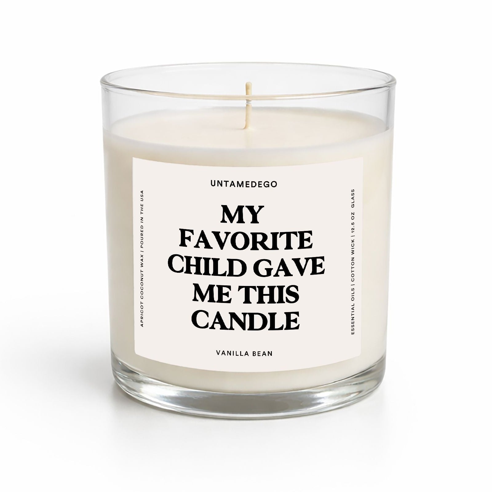 Candle in a glass jar with a label on a white background