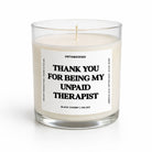 Candle in a glass jar with a label on a white background