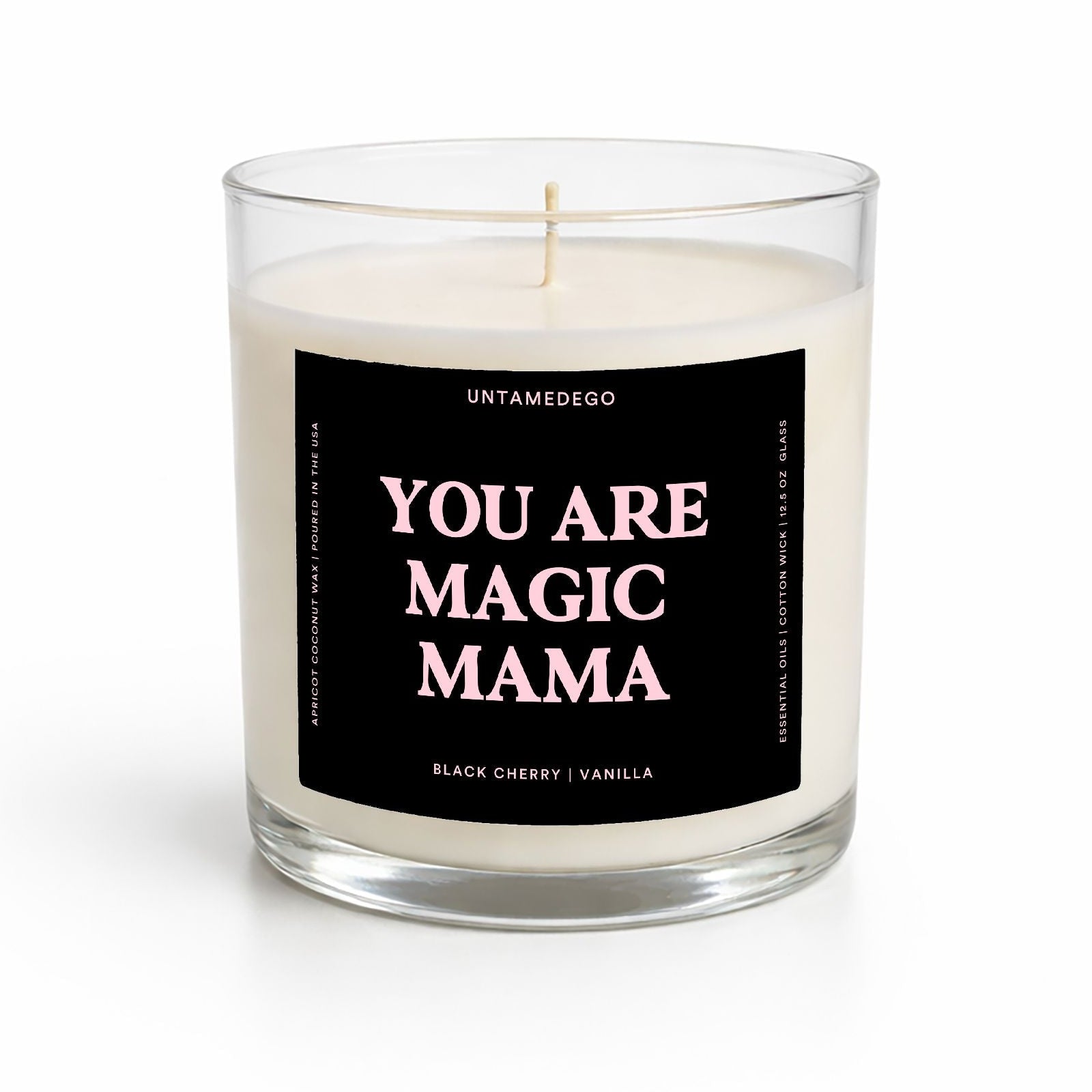 Candle in a glass jar with a black label on a white background