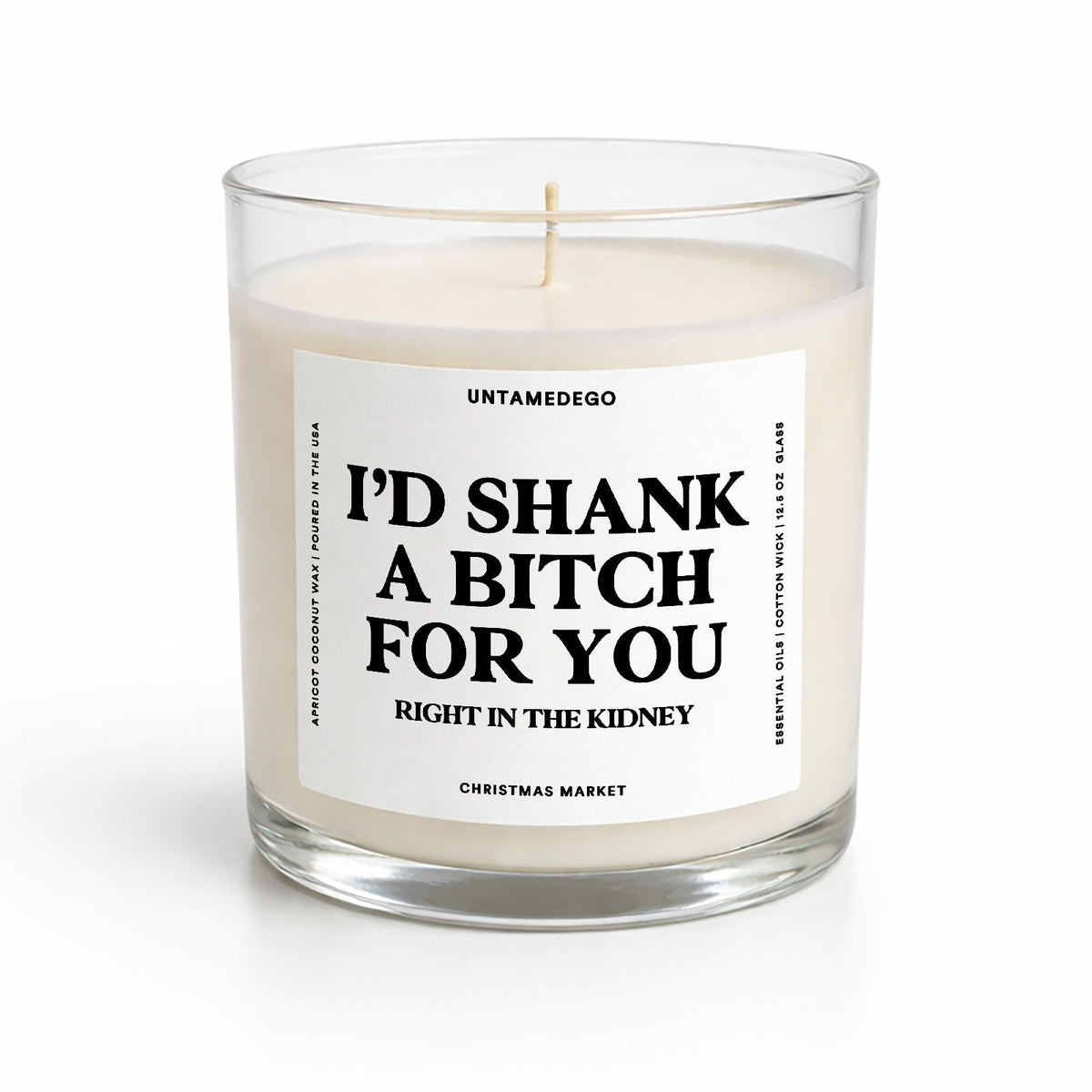 A wax candle in a clear glass jar with a white label that reads 'I'D SHANK A BITCH FOR YOU RIGHT IN THE KIDNEY' and 'VANILLA BEAN' at the bottom, on a white background.