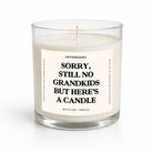 Candle in a glass jar with a label on a white background