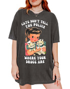 Funny graphic t-shirt with vintage cat illustration and bold humorous text about cats not telling the police