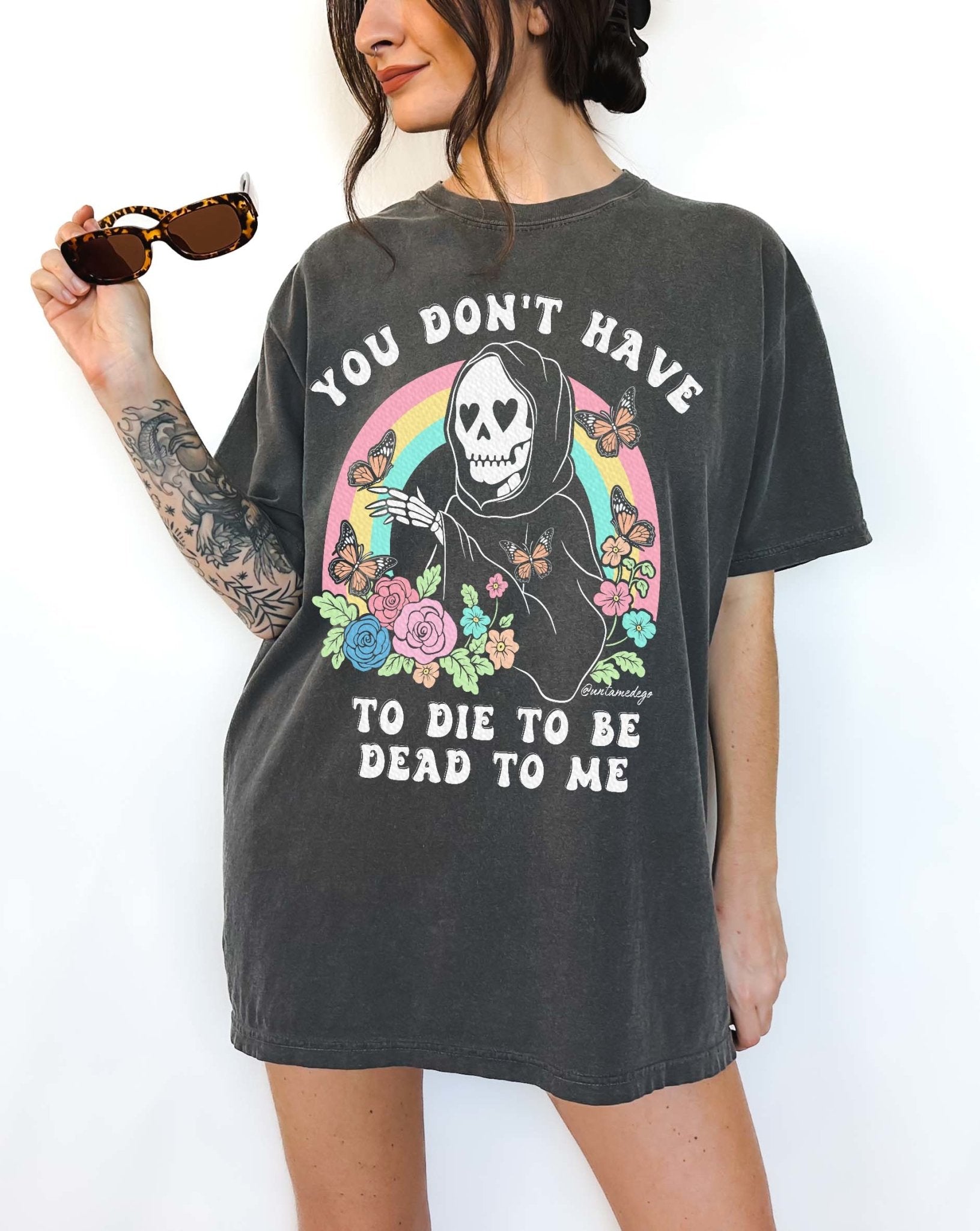 Funny dark humor graphic t-shirt with skeleton and text “you don’t have to die to be dead to me”