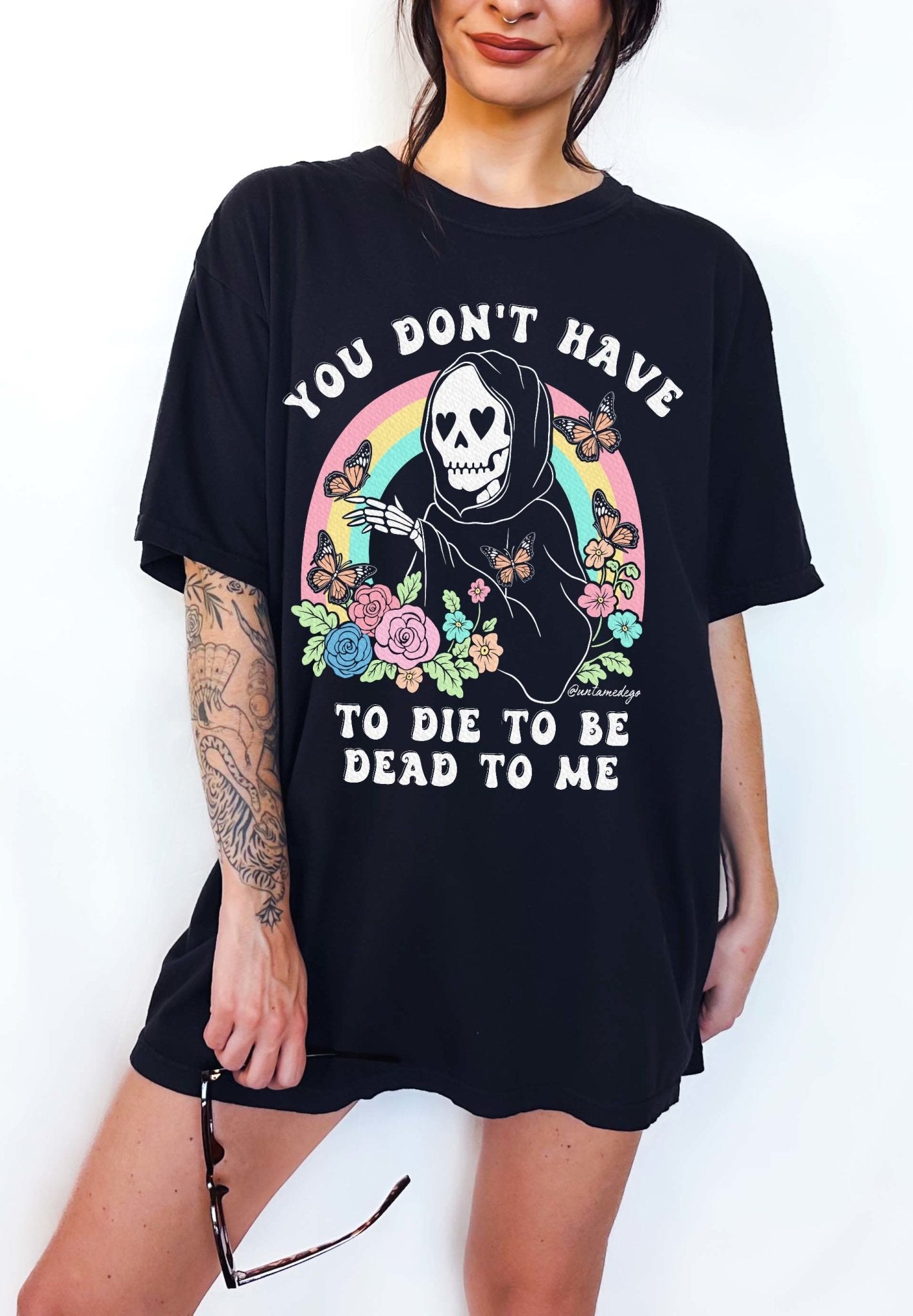Funny dark humor graphic t-shirt with skeleton and text “you don’t have to die to be dead to me”