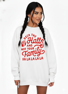 White sweatshirt with red text worn by a model on a white background