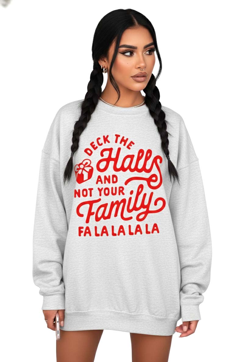 Woman wearing a gray sweatshirt with red text on a white background