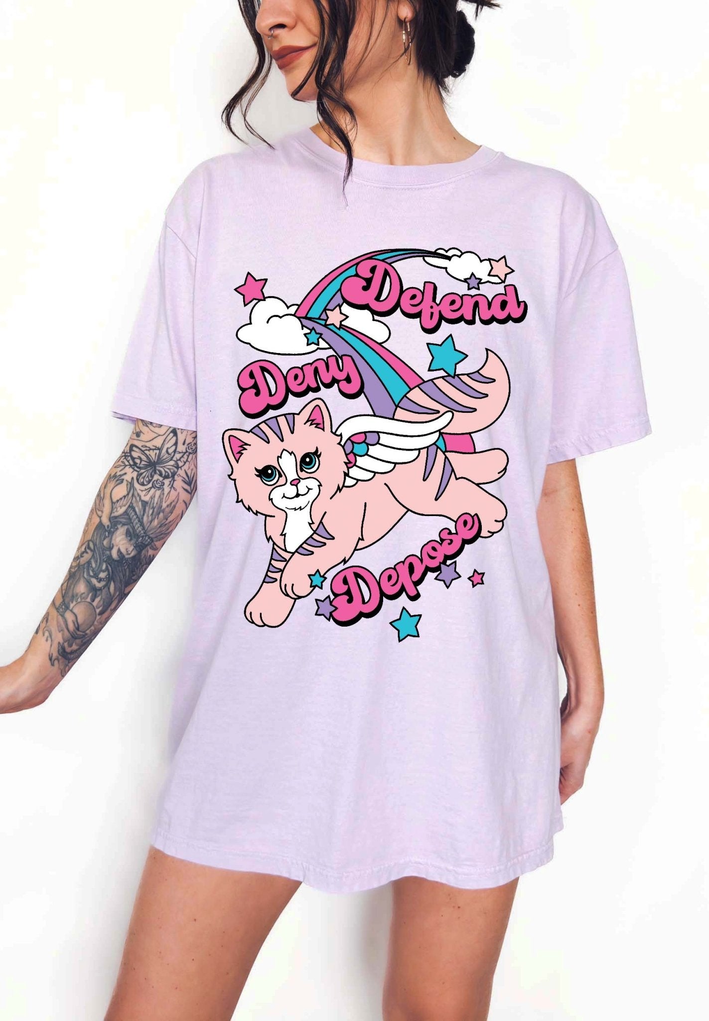 Funny graphic t-shirt with cute cat illustration and text saying deny defend depose
