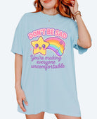 Funny graphic t-shirt with cute star and rainbow design and text saying don’t be sad you’re making everyone uncomfortable