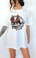 Funny graphic t-shirt with skull and flames illustration and text saying everything’s fine