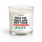 A clear glass jar candle with white wax and a single wick, featuring a white label with the text 'DECK THE HALLS AND NOT YOUR COWORKERS fu la la la' in black, red, and green lettering. The brand 'UNTAMEDEGO' is visible at the top of the label.
