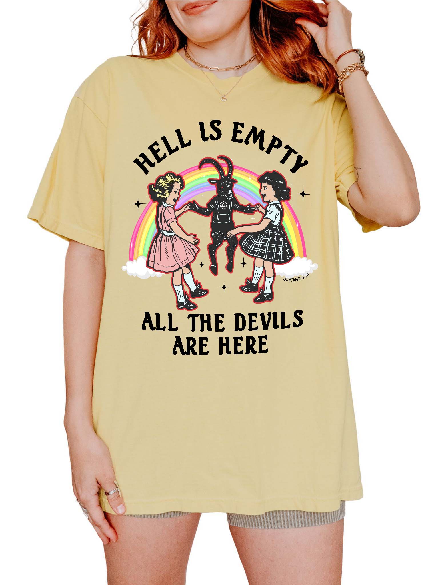 Person wearing a yellow t-shirt with a graphic design and text.