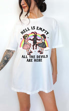 Dark humor graphic t-shirt with devil figure and text saying hell is empty all the devils are here