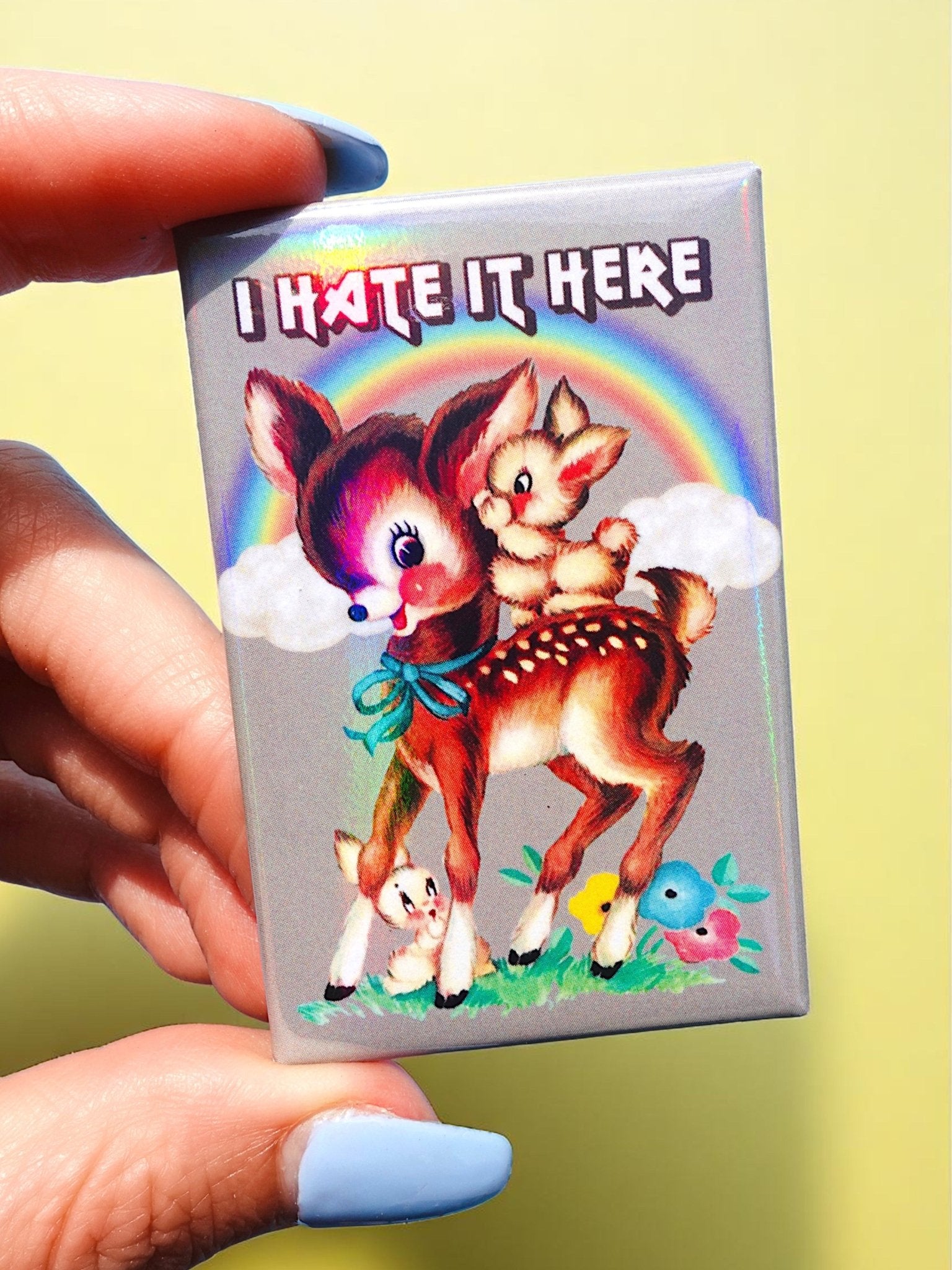 I Hate It Here Holographic Pin – Retro Rainbow Deer with Dark Humor - UntamedEgo LLC.