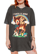 Funny graphic t-shirt with cute deer illustration and text saying I hate it here