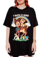 Funny graphic t-shirt with cute deer illustration and text saying I hate it here