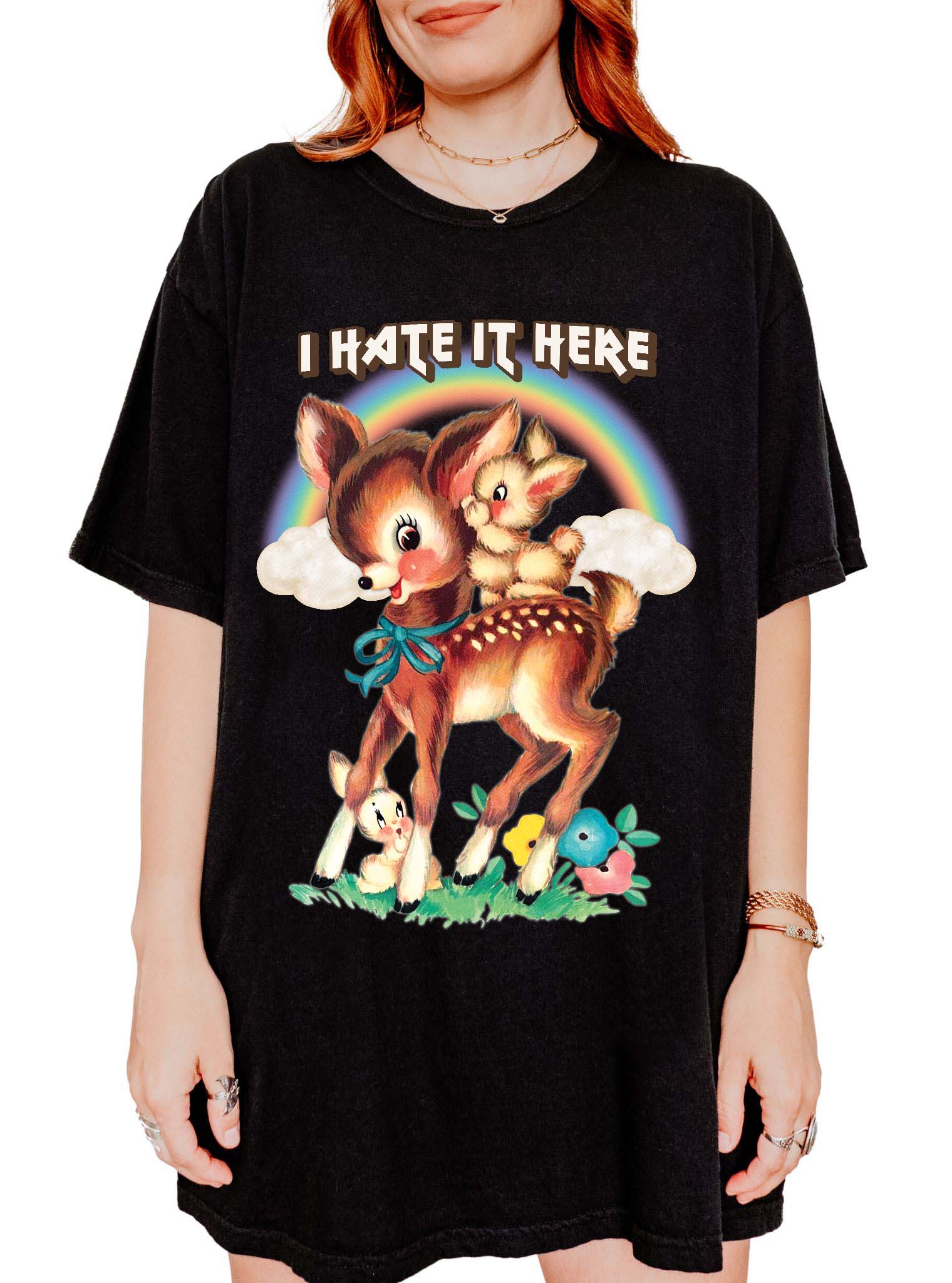 Funny graphic t-shirt with cute deer illustration and text saying I hate it here