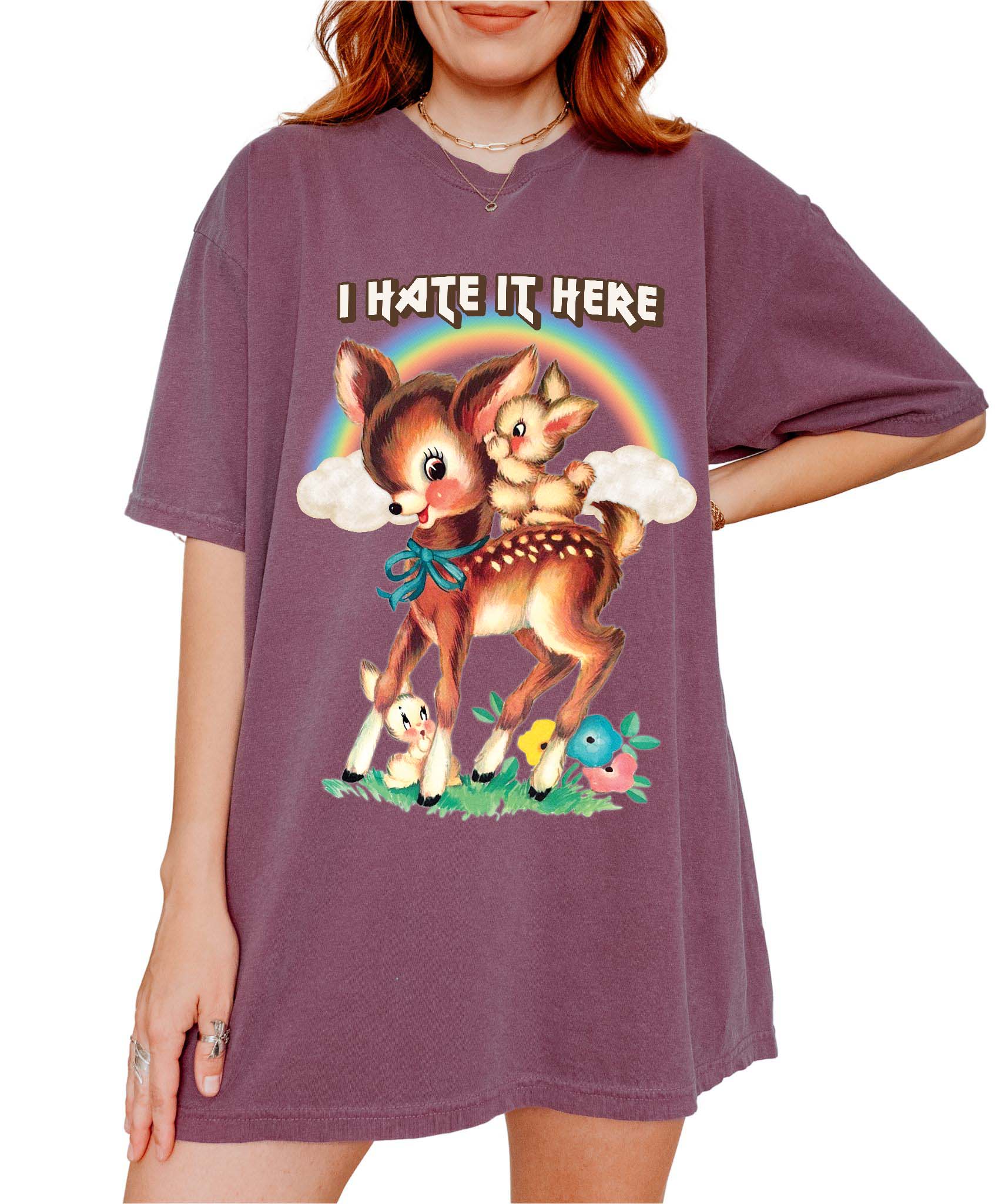 Funny graphic t-shirt with cute deer illustration and text saying I hate it here