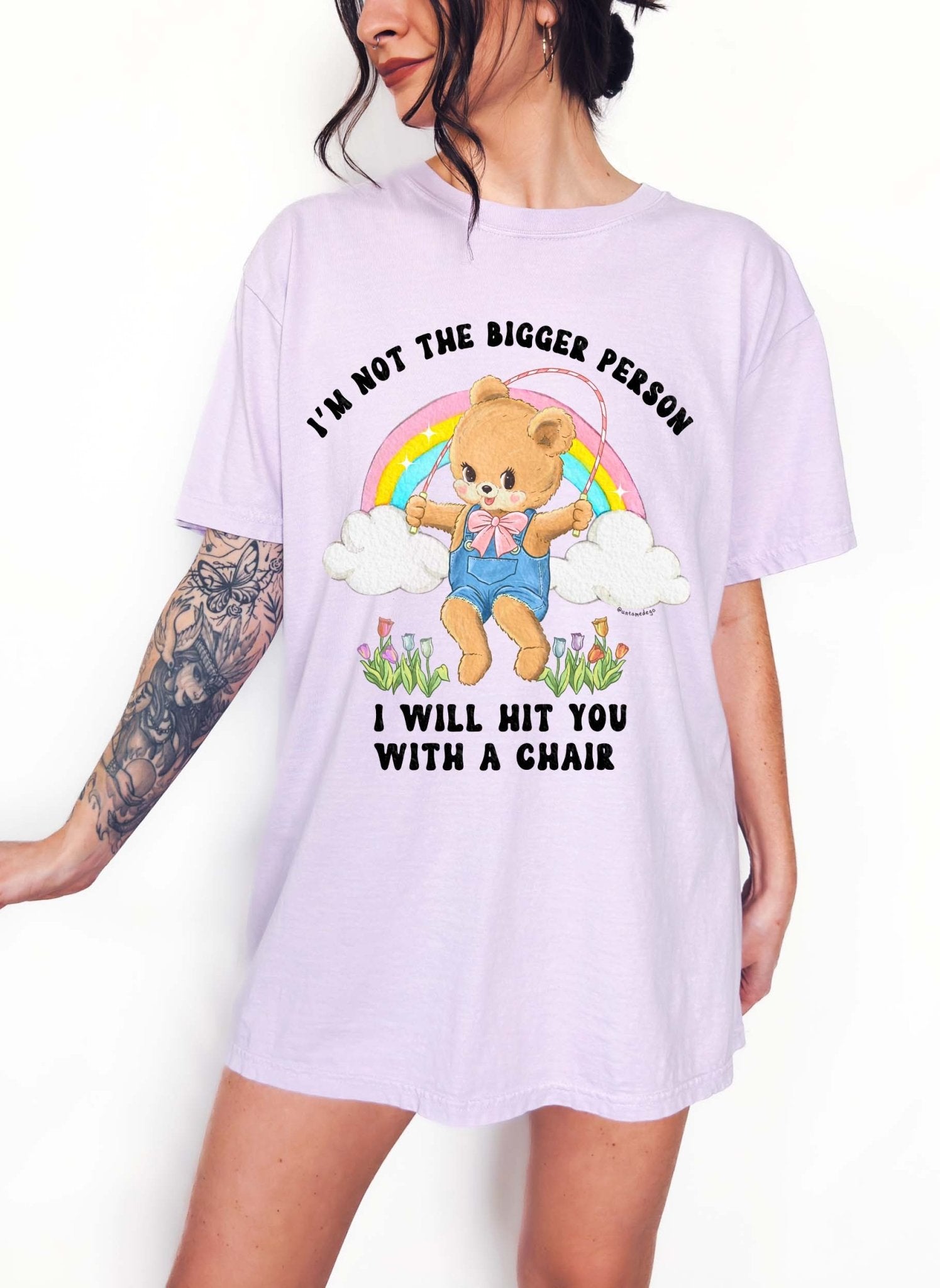 Funny graphic t-shirt with cute bear holding jump rope and bold text about not being the bigger person