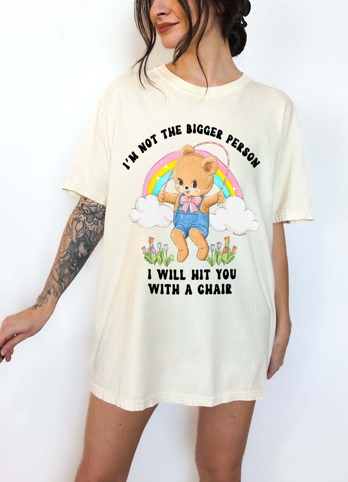 Funny graphic t-shirt with cute bear holding jump rope and bold text about not being the bigger person