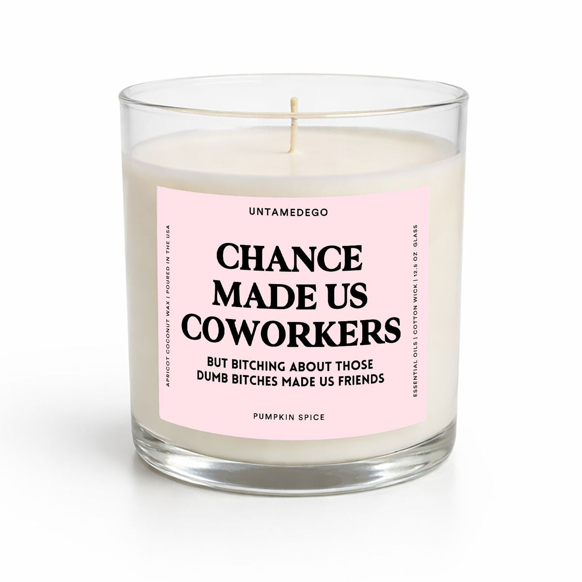 A glass jar candle with white wax and a pink label that reads 'CHANCE MADE US COWORKERS' with smaller text below, photographed on a clean white background.