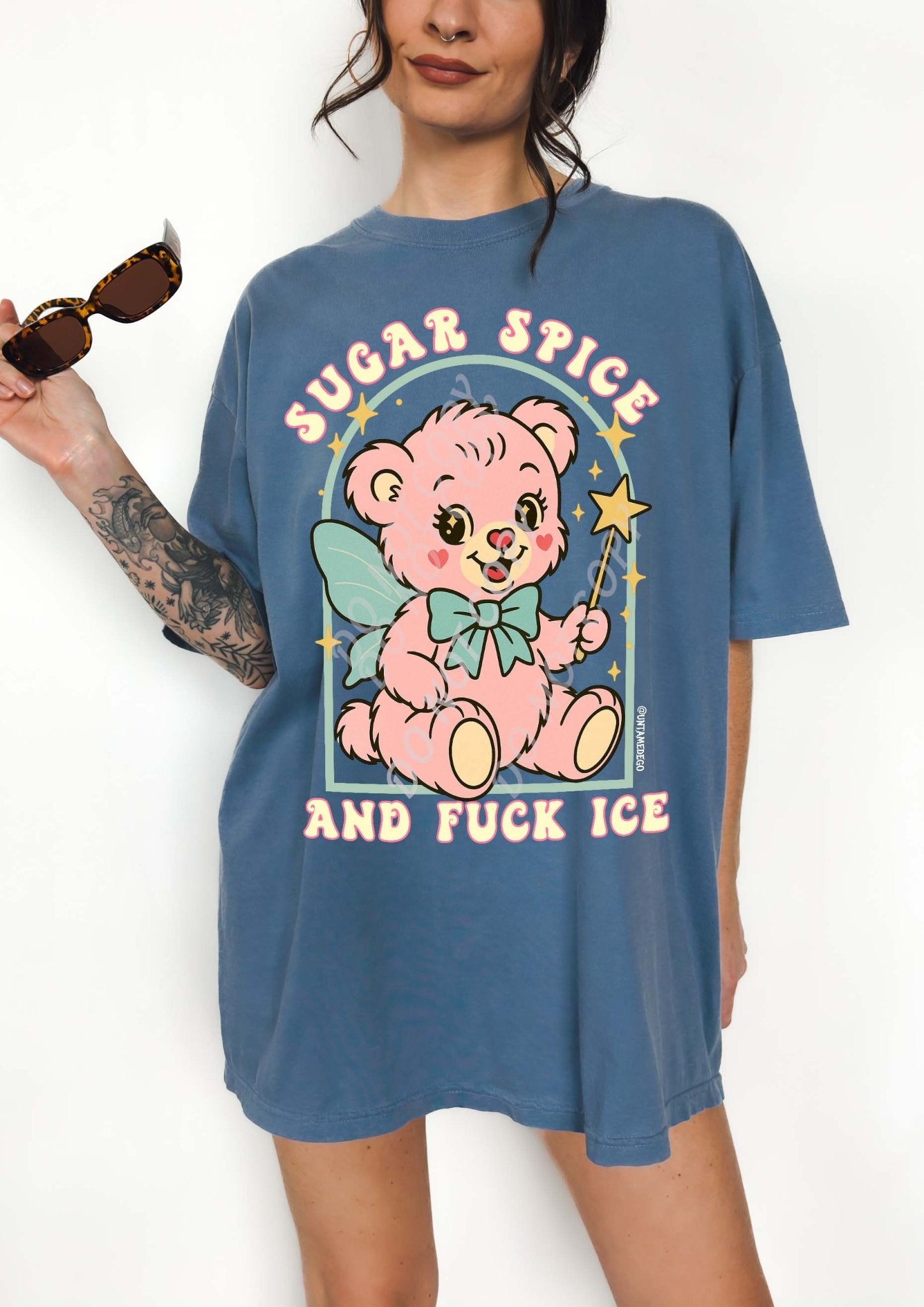 Graphic t-shirt with cute bear illustration and bold protest text reading sugar spice and fuck ICE