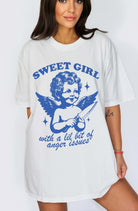 Graphic t-shirt with vintage angel illustration holding knife and text saying sweet girl with anger issues
