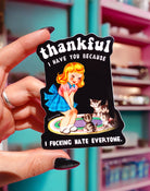 Funny vinyl sticker with retro-style girl and kittens on a rug. Text reads “Thankful I Have You Because I F*cking Hate Everyone.”